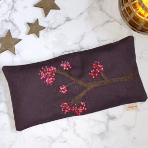 håndbroderet øjenpude blossom